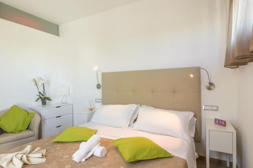 Un ou plusieurs lits dans un hébergement de l'établissement Suite du Parc & Hotel