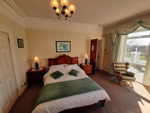 Posteľ alebo postele v izbe v ubytovaní Ardgort Country House