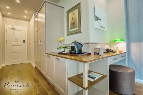 Hotel Residence Promenadeにあるキッチンまたは簡易キッチン