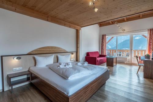 Postel nebo postele na pokoji v ubytování Hotel-Gasthof Andreas