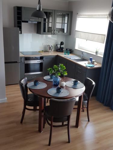 Kuchyň nebo kuchyňský kout v ubytování Apartament CITY VIEW Wes Quality Suite