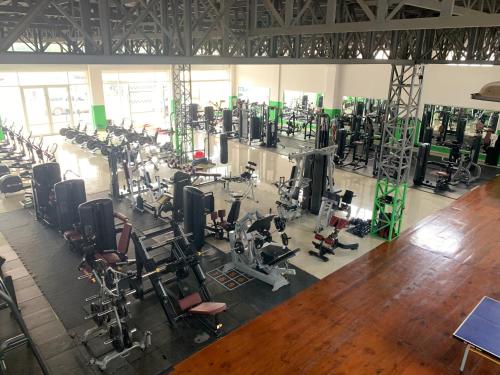 an overhead view of a gym with lots of equipment at Asia & Africa Hôtel in Antananarivo