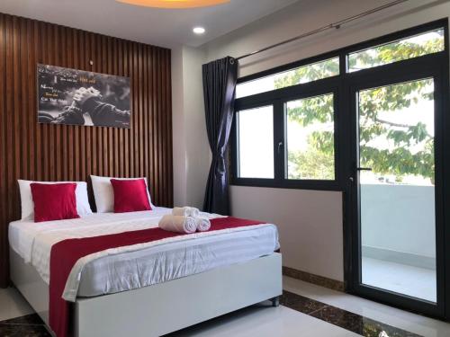 Ένα ή περισσότερα κρεβάτια σε δωμάτιο στο Soda House Cần Thơ