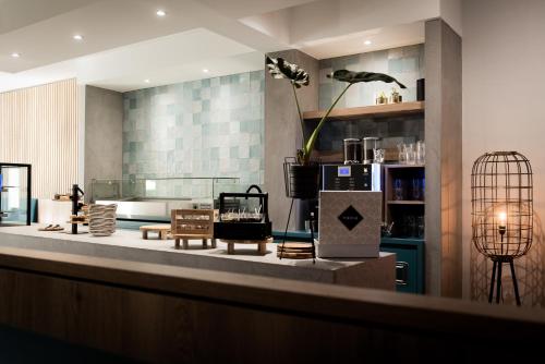 A kitchen or kitchenette at Hotel La Source Epen