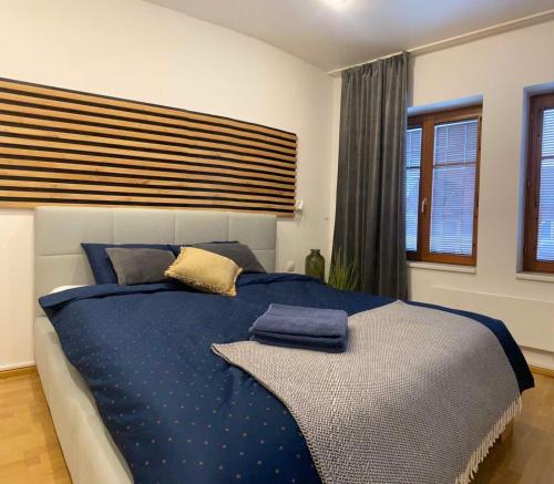 Posteľ alebo postele v izbe v ubytovaní Apartmán Lara