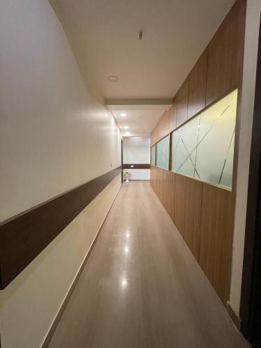 an empty bowling alley in a building at Maps Inn in Ghaziabad