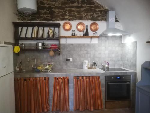 Кухня или кухненски бокс в casa del vicolo verde
