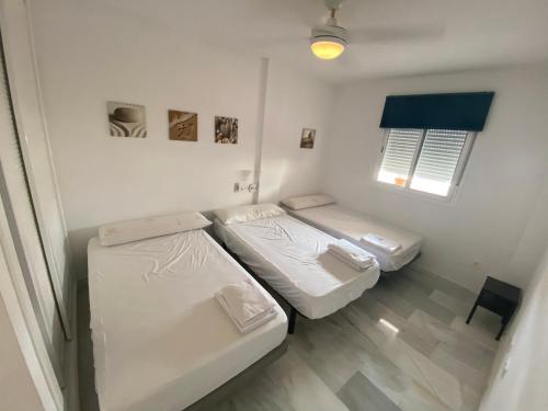 Кровать или кровати в номере Apartamento Vacacional para familias y mascotas
