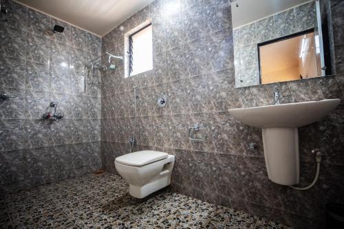 Ванная комната в Vinsons Cottages