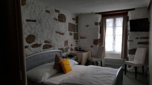 Postel nebo postele na pokoji v ubytování Hotel Murtenhof & Krone