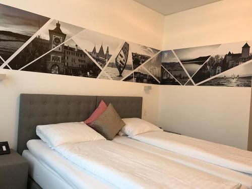 Postel nebo postele na pokoji v ubytování Hotel Murtenhof & Krone