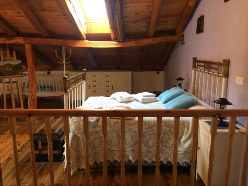 Un pat sau paturi într-o cameră la Casa Los Aperos