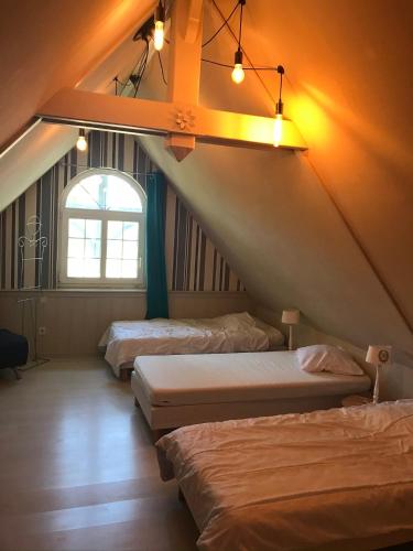 Katil atau katil-katil dalam bilik di Chambres d'Hôtes Fleur de Sel