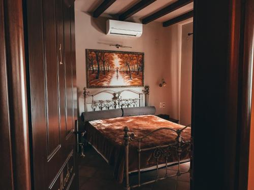 Ένα ή περισσότερα κρεβάτια σε δωμάτιο στο Ξενώνας Έλενα