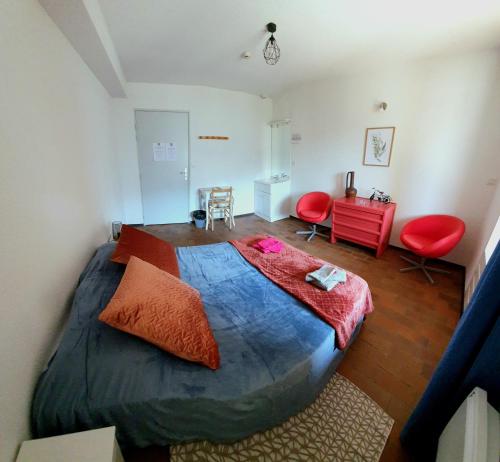 Ένα ή περισσότερα κρεβάτια σε δωμάτιο στο Auberge Collective Cozy&Family