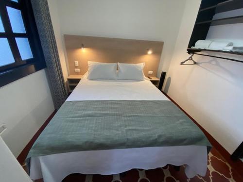 Ein Bett oder Betten in einem Zimmer der Unterkunft Casa Capirucho