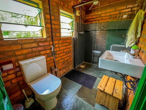Ванная комната в Charmoso Refúgio nas Montanhas com 8 Cachoeiras Privativas