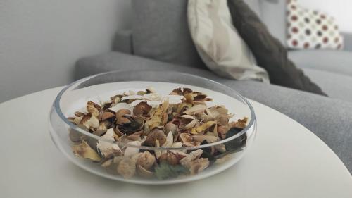 a bowl of nuts on top of a table at I love Rapallo La casa AlMar in Rapallo