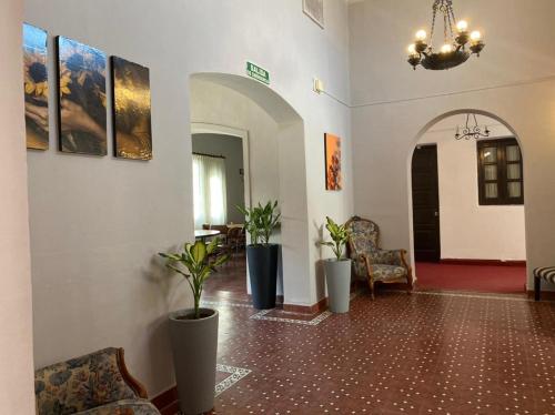 Χώρος καθιστικού στο Hotel Cervantes