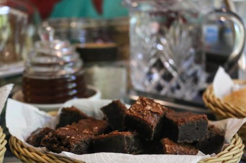 a basket of brownies sitting on a table at Flamboyant Residence in Fernando de Noronha