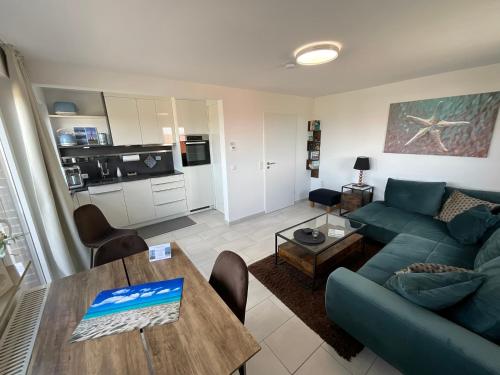 Kuchyň nebo kuchyňský kout v ubytování Ferienwohnung in Dornumersiel an der Nordsee