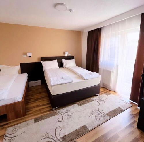 Postel nebo postele na pokoji v ubytování Hotel Casablanca