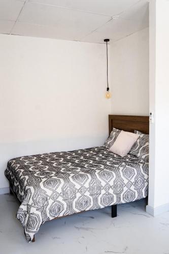 Postel nebo postele na pokoji v ubytování Doral Executive Apartments