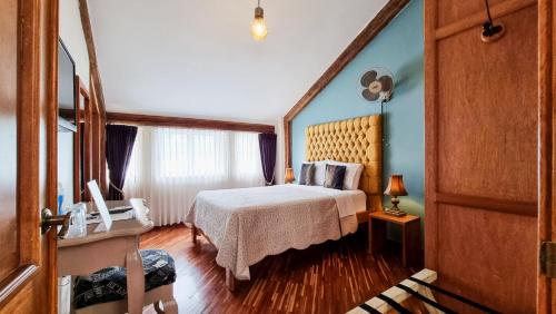 Postel nebo postele na pokoji v ubytování Casa Joaquin Boutique Hotel
