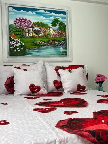 Postel nebo postele na pokoji v ubytování APARTAMENTO CON VISTA A LAS MONTAÑAS CAPACIDAD 6 PERSONAS SECTOR VILLAMARIA