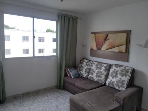 Ruang duduk di Apartamento inteiro próximo aeroporto de Confins