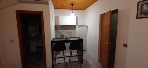 Η κουζίνα ή μικρή κουζίνα στο Apartments Bosnic