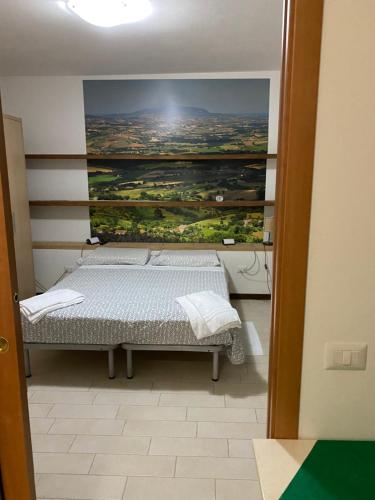 Cama o camas de una habitación en Colle Sul Lago