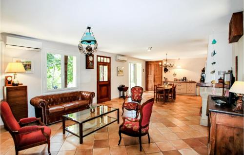 a living room with a couch and chairs and a table at Awesome Home In Flaviac With Wifi in Flaviac