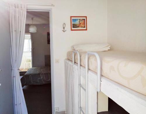 Postel nebo postele na pokoji v ubytování Appartement vue mer