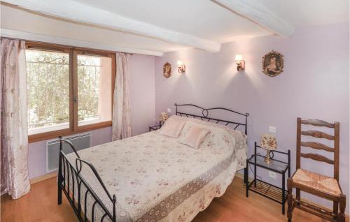 a bedroom with a bed and a window at Cozy Apartment In Castagniers With House A Mountain View in Porcio