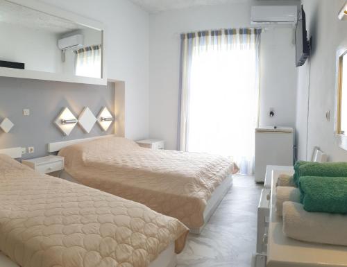 Krevet ili kreveti u jedinici u objektu Porto Castello
