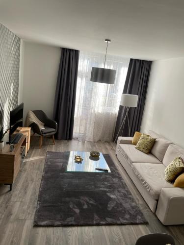Posteľ alebo postele v izbe v ubytovaní Vidus Apartman Kaposvár