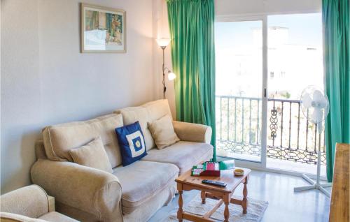 A seating area at 2 Bedroom Awesome Apartment In Mijas