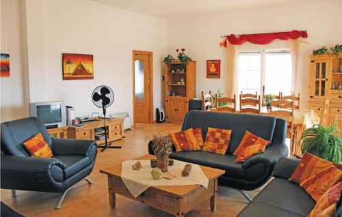 a living room with two couches and a coffee table at Beautiful Home In Monnegre With House Sea View in Monnegre de Arriba