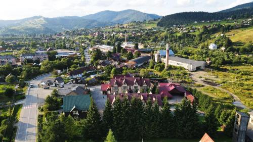 an aerial view of a small town in the mountains at Туристичний комплекс ВОРОХТА 365 Turistichesky Kompleks Vorokhta 365 in Vorokhta