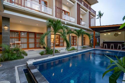 Бассейн в The Pulau Bungalow или поблизости