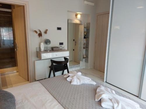 Postel nebo postele na pokoji v ubytování ELITE LUXURY APARTMENTS