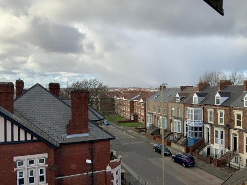 a view of a town with houses and a street at Luxurious Loft Flat 2-bed/2-bath in South Shields