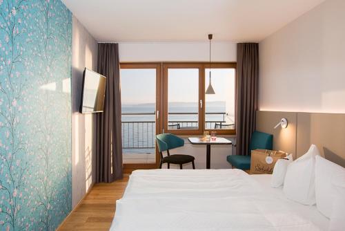 Postel nebo postele na pokoji v ubytování Hotel Restaurant Seehalde
