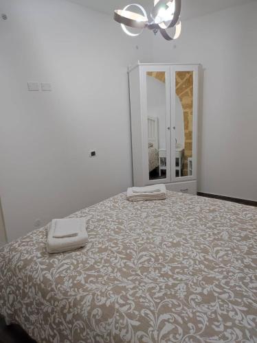 Cama o camas de una habitación en Le Case di Mariù