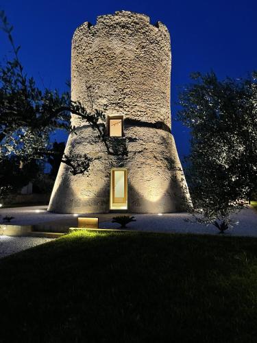 a building with a window in front of it at Torre Granitola Suite in Granitola