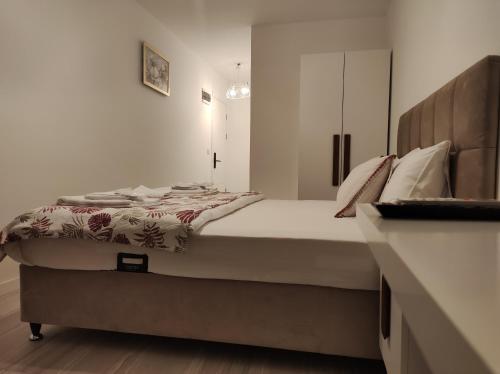 a bedroom with a bed and a counter with at Tepehan by Özkul in Izmir