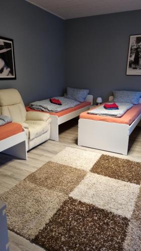 Postel nebo postele na pokoji v ubytování Flensburg City 4