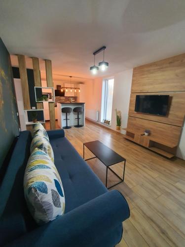 Μια τηλεόραση ή/και κέντρο ψυχαγωγίας στο ApartHotel Dominic Residence