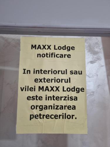 Πιστοποιητικό, βραβείο, πινακίδα ή έγγραφο που προβάλλεται στο MAXX Lodge